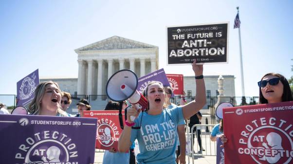 Pro-life activists rally at the Supreme Court ahead of the June ruling overturning Roe v. Wade.