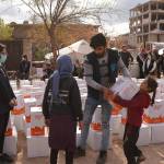A convoy delivers aid in northwest Syria.