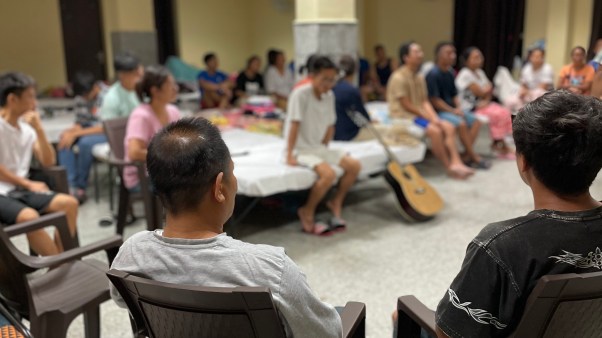 Evening worship at the Delhi Relief facility.