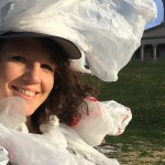 Sadie McElrath dresses as a "plastic bag monster" to talk to state legislators about trash.