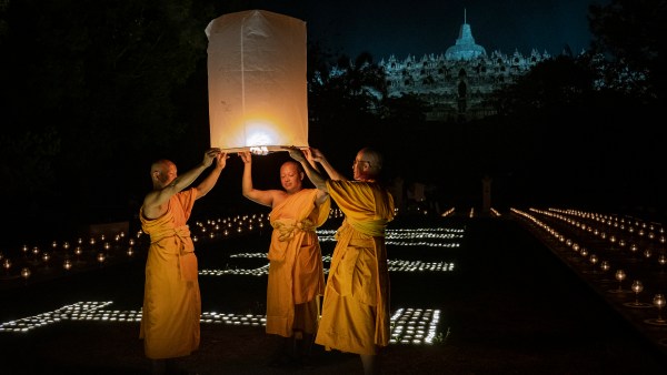 Buddhist monks at Borobudur Temple in Indonesia