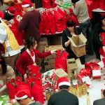 South Koreans pack and wrap Christmas gifts for a charity that delivers gifts to the poor.