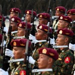Military officers marching in Myanmar.