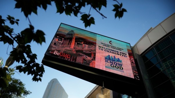 A sign outside the Charlotte Convention Center promoting the United Methodist Church General Conference.