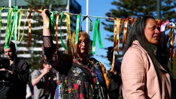 The public taking part in a hikoi prior to the release of the Abuse in Care report at Parliament on in New Zealand. 