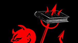 The devil with his pitchfork stuck in a book