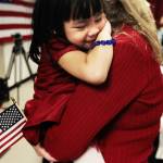Mother hugs her adopted Chinese daughter at US naturalization ceremony