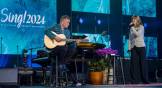 Keith and Kristyn Getty sing from the stage at the Sing! Conference in Nashville.