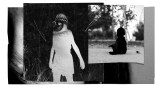 A photo of a baby and child cut out with the eye of a woman peeking through the child's silhouette