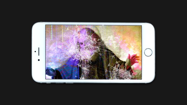 A painting of God on a smartphone with a cracked screen.