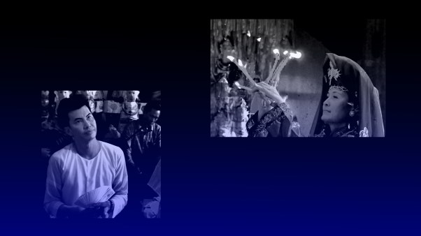 Shaman in Vietnam holding candles
