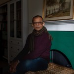 A photo of Rahil Patel sitting on a crate