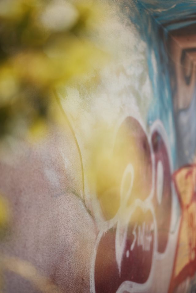 Blurry photo of graffiti on a wall