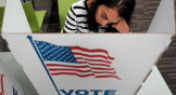 A woman voting in the 2024 presidential election.