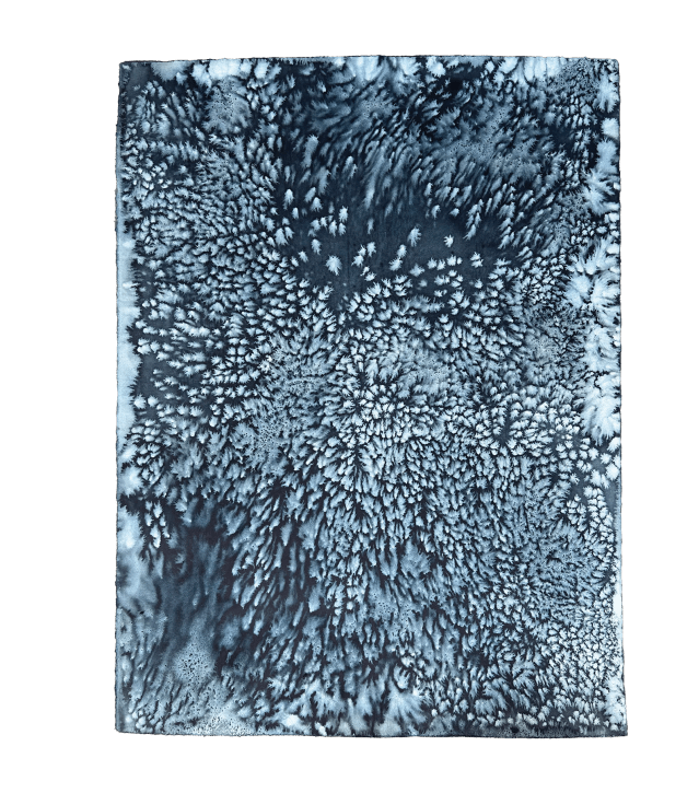 Blue and white watercolor painting that mimics snow falling from the sky or frost on a window.